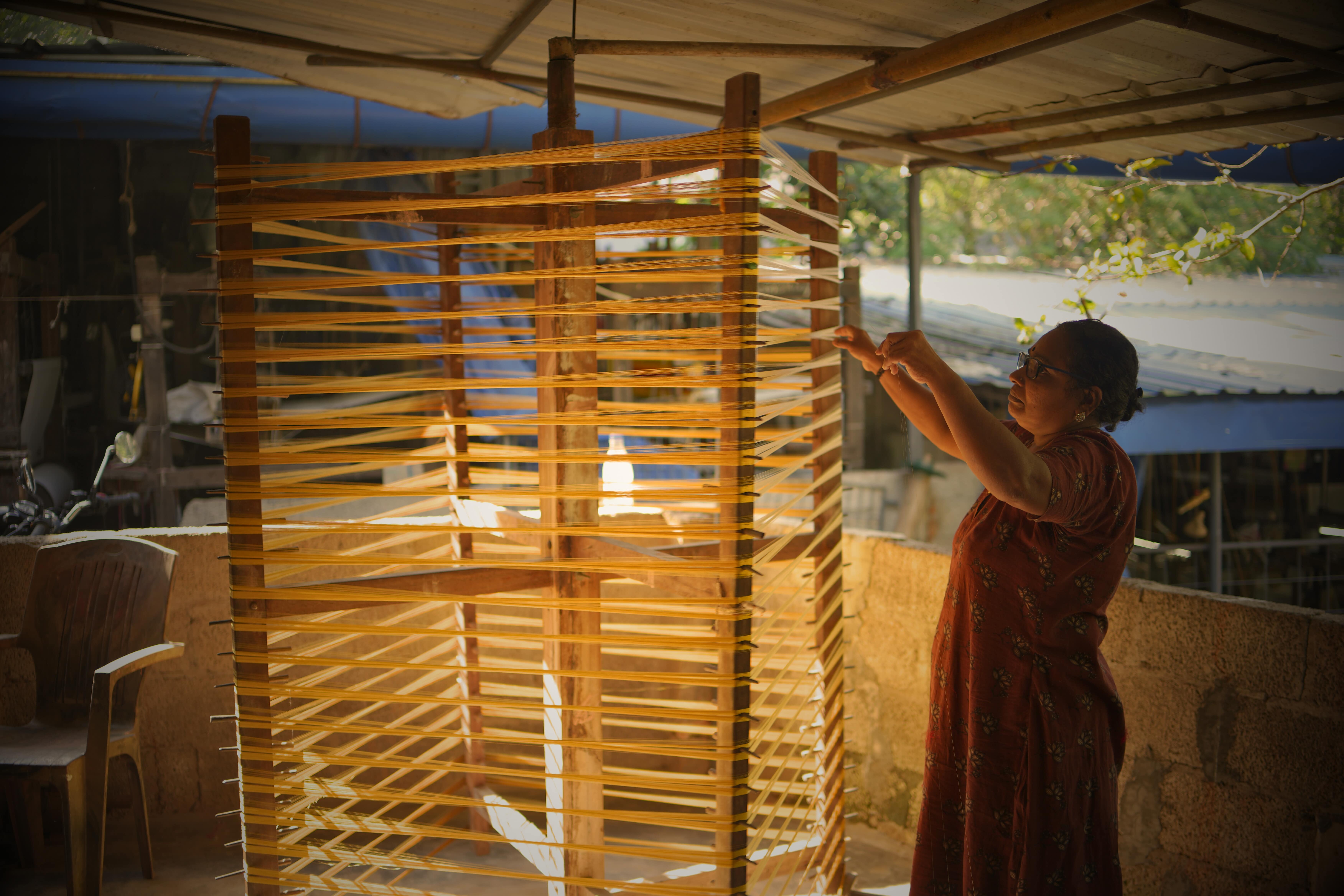 Warp threads stretching outdoors